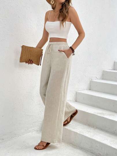 SHEIN Frenchy Pantalones casuales de pierna ancha de bolsillos sueltos con lazo en la cintura de unicolor para mujer