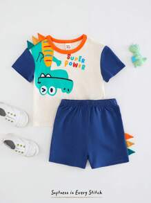 Cozy Pixies Set de 2 piezas de parte superior de manga corta y pantalones cortos con cintura elástica, con diseño de dinosaurio de dibujos animados y bloques de color, para bebé niño