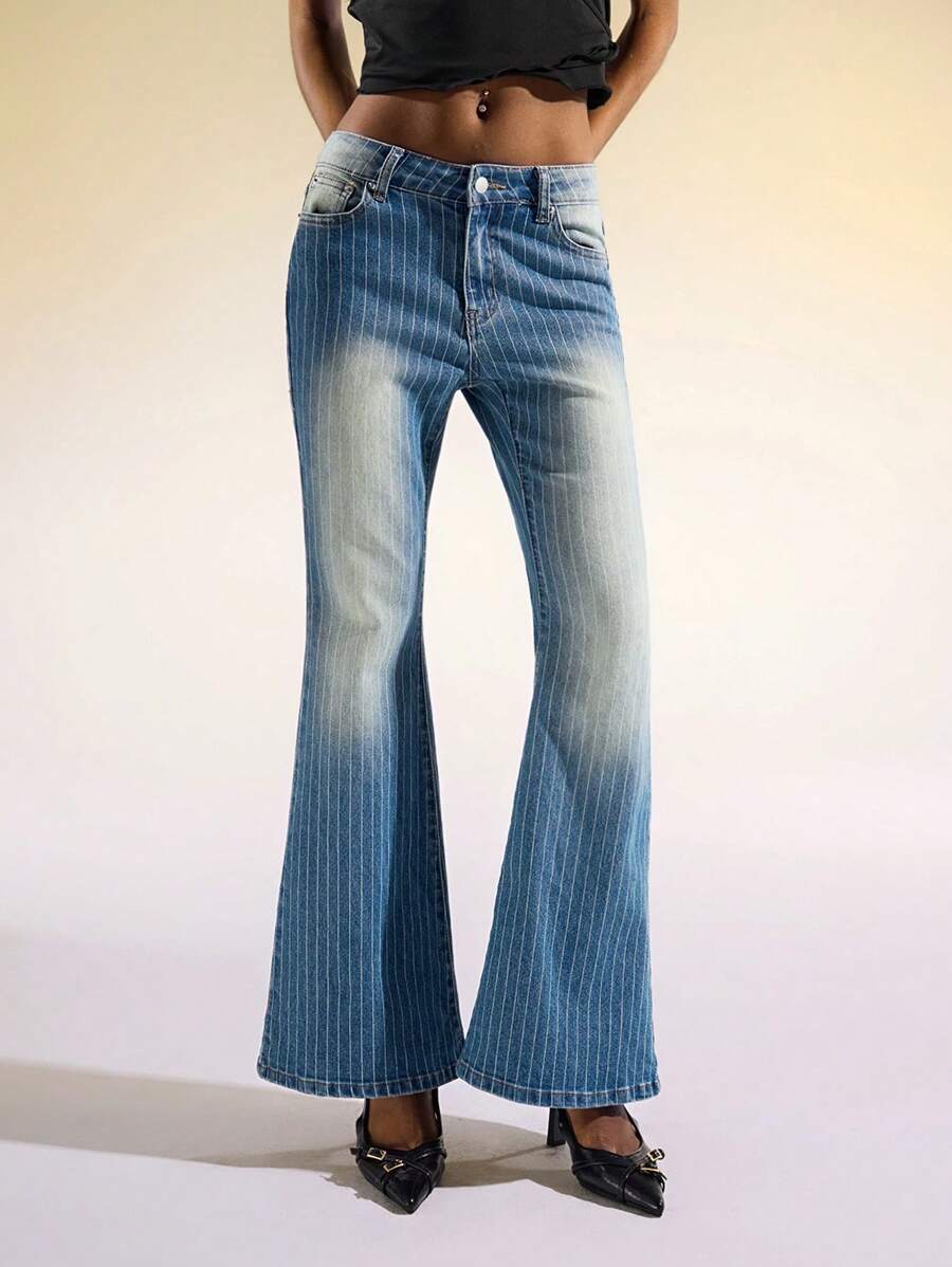 Easelle Jeans acampanados de tiro bajo con lavado vintage a rayas - Azul - Ver 1