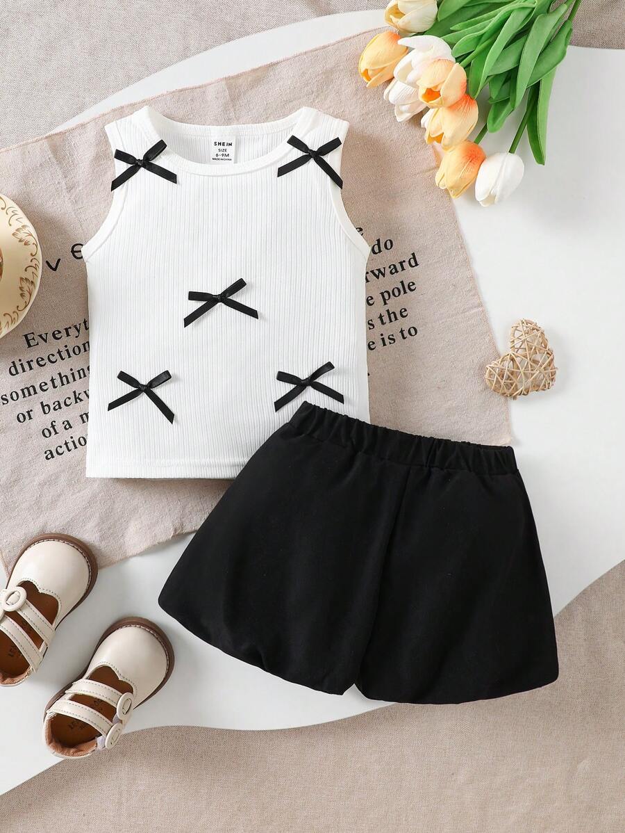 Conjunto de top sin mangas y pantalones negros abombados para niña bebé, decorado con lazos negros tridimensionales dulces y frescos, ideal para jugar a diario - Multicolor - Ver 1