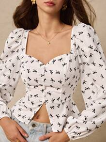 Poéselle Women's Sweetheart Neck Long Sleeve Bow Print Pearl Hem Split Blouse - White - View 1