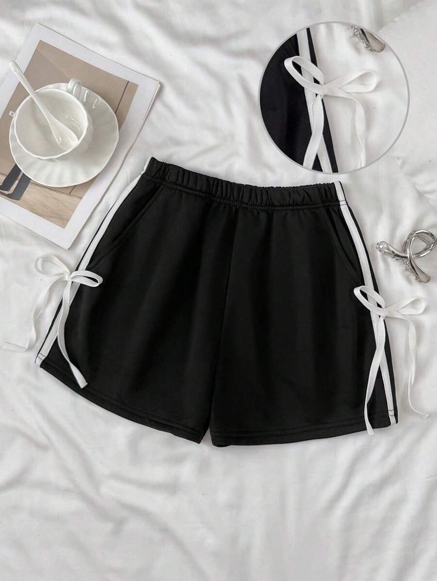 SHEIN Quần short dáng rộng phối đen trắng tương phản dành cho nữ tuổi teen, kiểu dáng đường phố đa năng, thích hợp mặc hàng ngày, mùa xuân/hè, mùa tựu trường, mùa hè. - Đen và trắng - Xem 1
