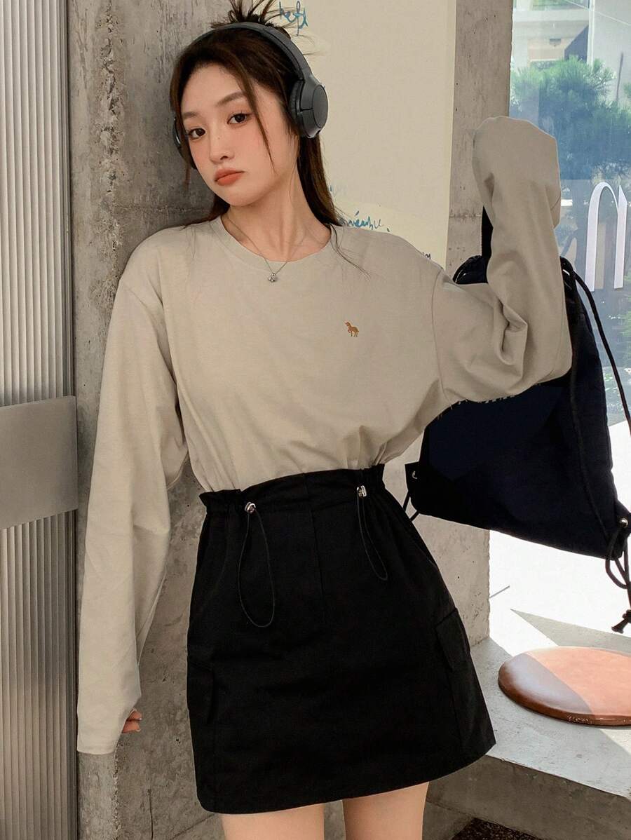 DAZY Áo thun hở vai họa tiết hoạt hình, Quần áo nữ mùa thu - Màu be - Xem 1