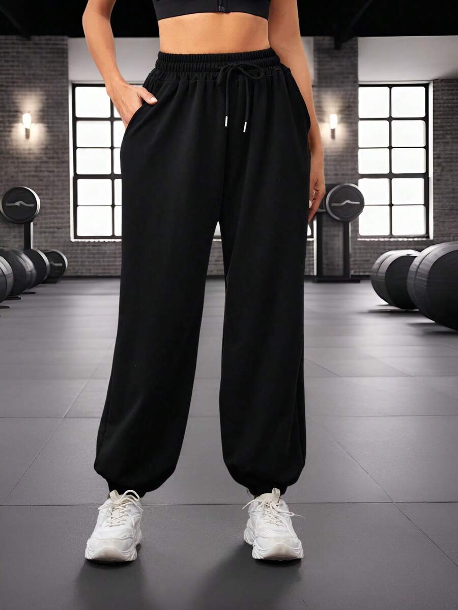 SHEIN Sports 女士純色束口褲,帶有彈性袖口 - 黑色 - 查看 1
