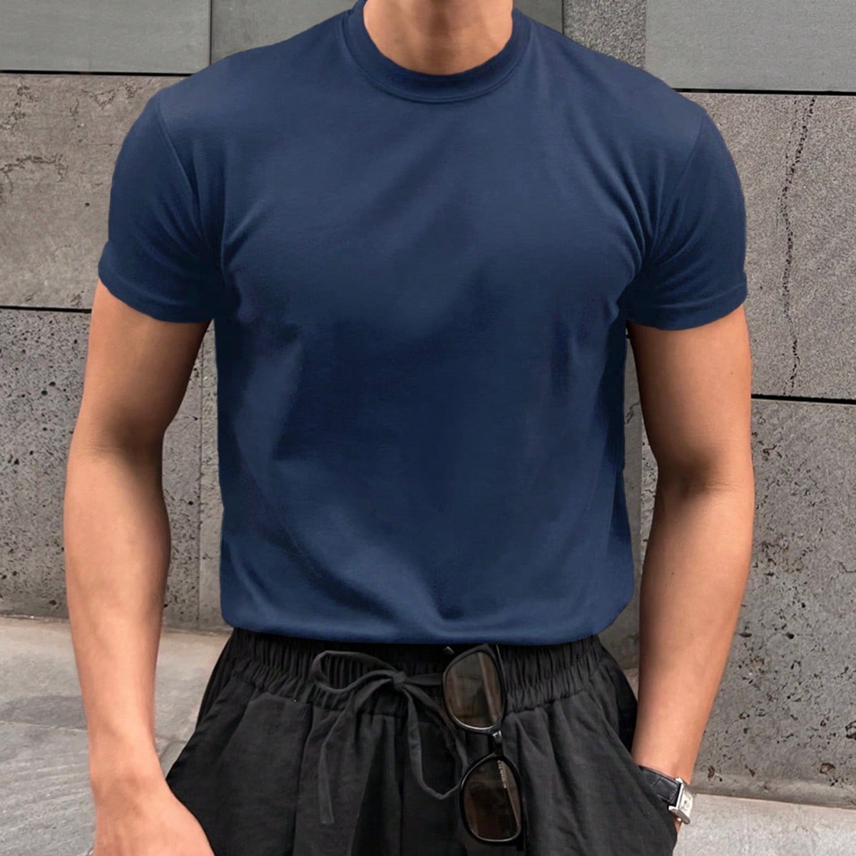 Camiseta casual de manga corta de cuello redondo de unicolor y holgada para hombre