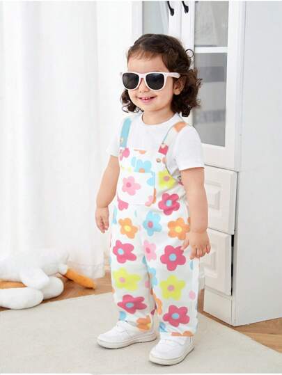 SHEIN Pelele con tirantes con estampado floral azul versátil y lindo para recién nacido niña