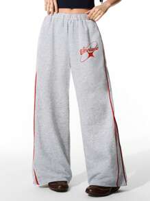 SHEIN Pantalones casuales de chándal para niñas preadolescentes con cintura elástica, a rayas rojas y diseño gráfico de letras, para primavera/verano