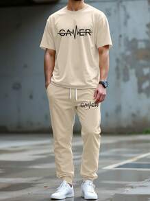 Manfinity Homme Męski zestaw T-shirt i spodnie, minimalistyczny i modny, odpowiedni na lato - Kolor khaki - Zobacz 1