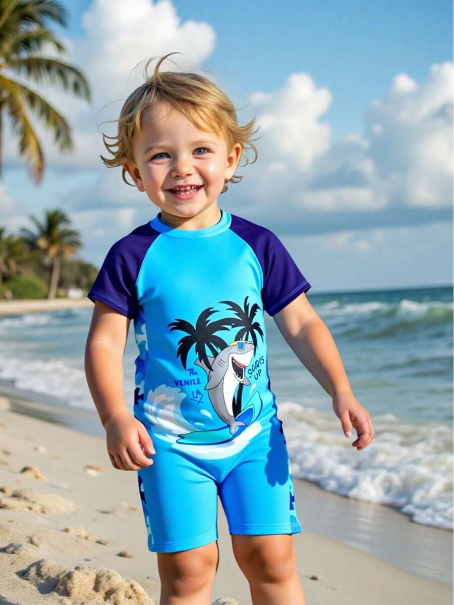 SHEIN Young Boy Cute Cartoon Shark Print Raglan Sleeve Swimsuit With Swim Cap