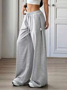 Flirla 2 paquetes de pantalones casuales anchos de cintura baja y de unicolor para mujer, versátiles, para primavera/verano 2025
