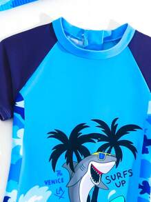 SHEIN Young Boy Cute Cartoon Shark Print Raglan Sleeve Swimsuit With Swim Cap