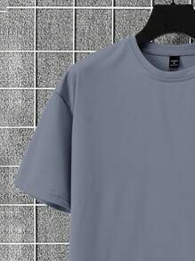 Manfinity Homme Set de 2 piezas de camiseta de manga corta de unicolor y pantalones cortos de trabajo para hombre