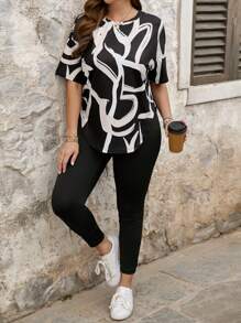 SHEIN LUNE 2pcs/Set Plus Size Casual Abstract Printed Round Neck Short Sleeve Longline Top And Plain Color Leggings - Black - View 3