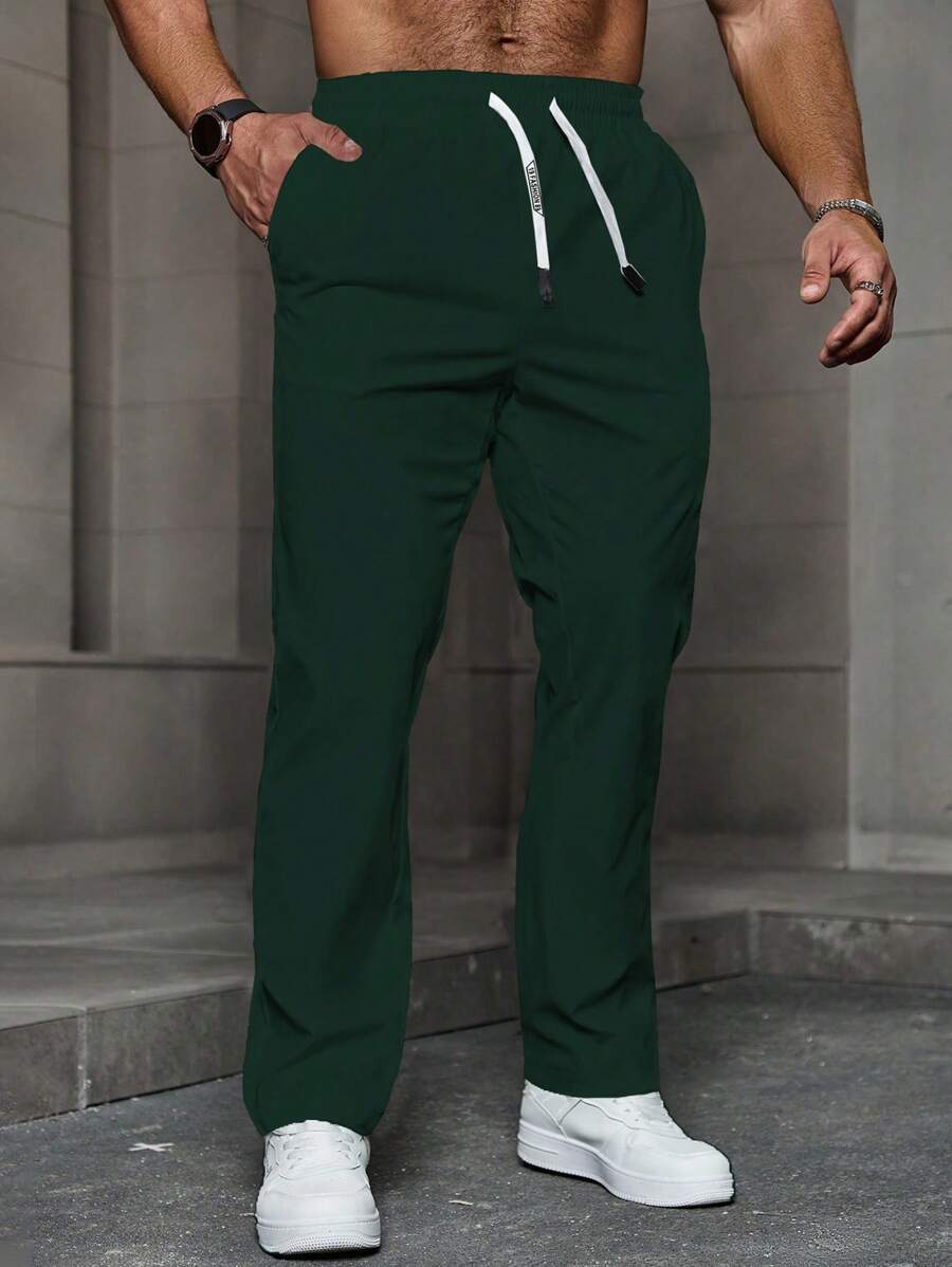 Manfinity Homme Men's Solid Color Drawstring Waist Pockets Straight Casual Loose Pants Men Pants Classic - Dark Green - View 1