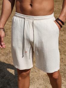 Manfinity Nomadique Pantalones cortos holgados de hombres de unicolor de moda, todo a juego, de lino liso bohemio, aptos para el ocio diario, el uso en vacaciones, shorts simples y casuales en verano
