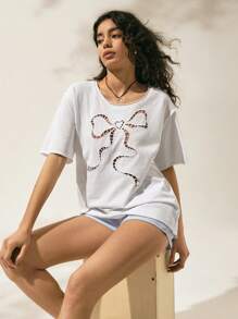 Easelle 2025 Nuovi arrivi estivi, stile vacanziero da donna, maglietta casual da donna in colore unito con fiocco cavo - Bianco - Visualizzare 4