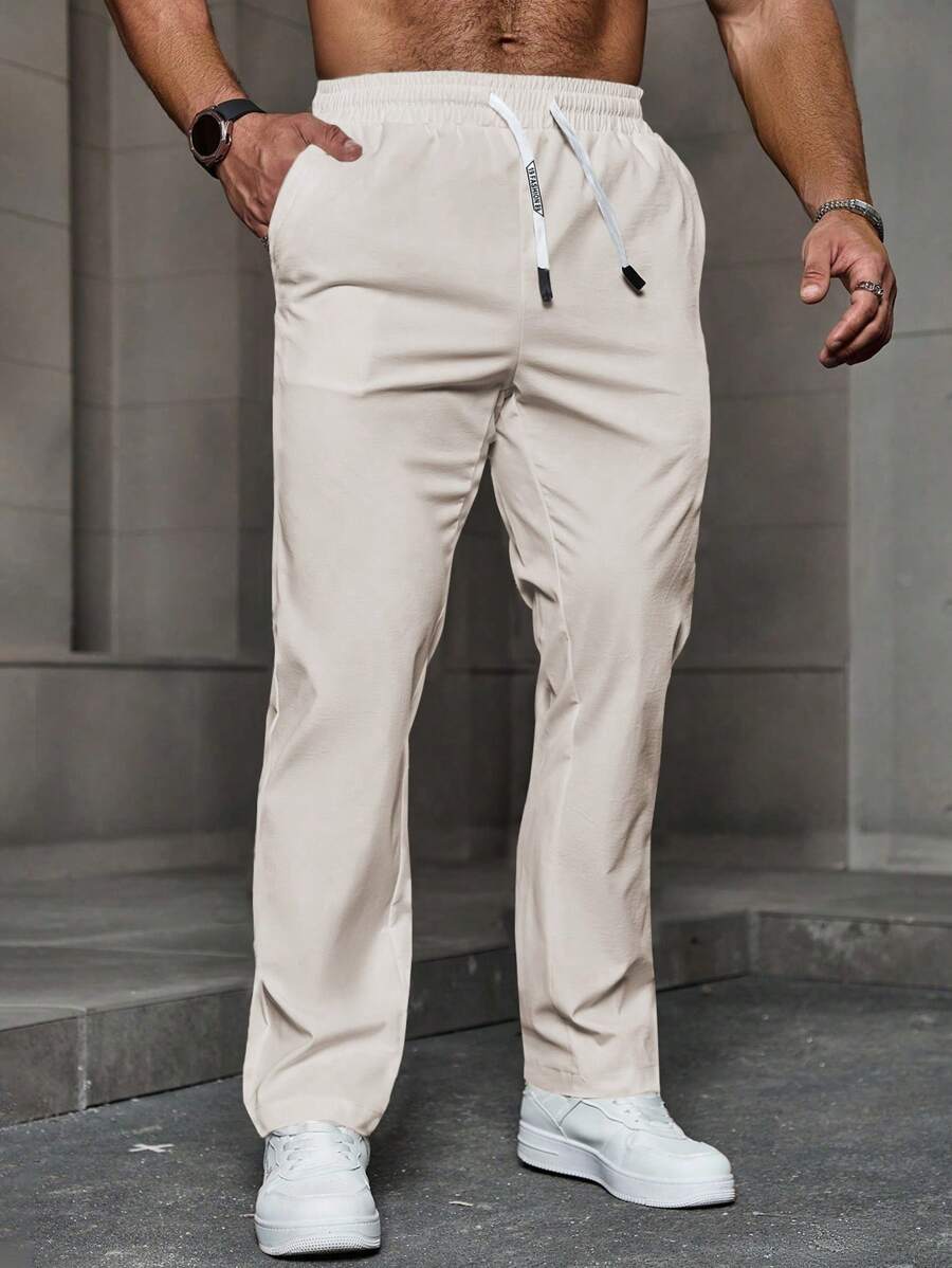 Manfinity Homme 男士简约纯色抽绳腰休闲裤男士裤子休闲秋季 - 杏色 - 查看 1