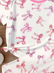 SHEIN Tween Girls 可爱手绘粉色蝴蝶结印花紧身睡衣套装，休闲舒适，适合春夏季