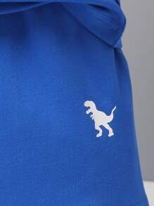 SHEIN Conjunto de top sin mangas y pantalones cortos deportivos con estampado de dinosaurios para niños/as en verano