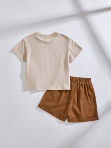 SHEIN Ragazzo giovane, set maglietta a girocollo a maniche corte con stampa di leoni e pantaloncini con bottoni di legno - Multicolore - Visualizzare 2