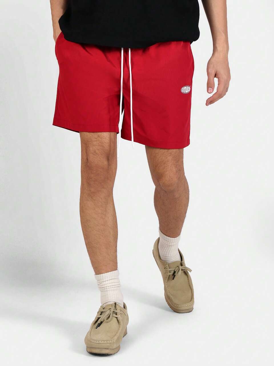 Pantalones cortos relajados con bolsillos laterales