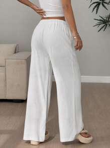 Flirla Pantalones casuales cómodos y ajustados de color liso para mujer