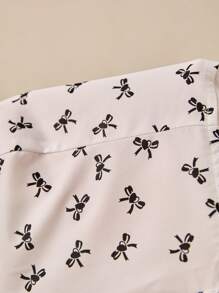 Poéselle Women's Sweetheart Neck Long Sleeve Bow Print Pearl Hem Split Blouse - White - View 7