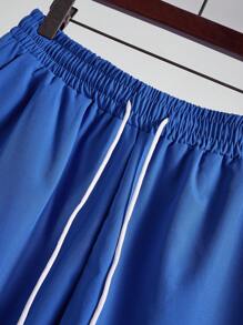 Manfinity RSRT Conjunto de top de tirantes y shorts de moda sencilla para hombre, apropiado para ropa de playa de verano