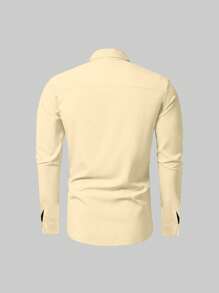 Manfinity Mode Camisa casual/de negocios de manga larga y de un solo pecho de unicolor para hombre de talla grande