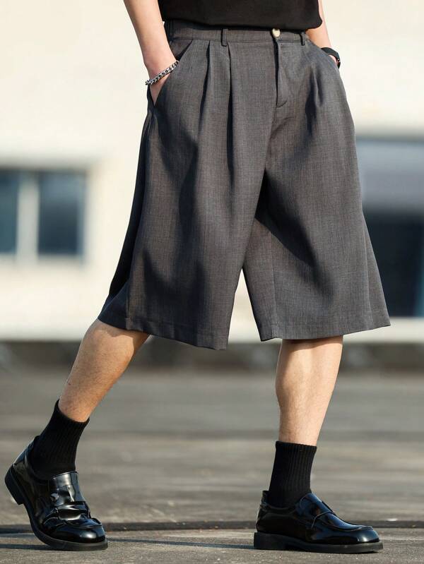 Manfinity CasualKnits Men's Solid Color Pleated Pocketed Loose Casual Knee-Length Shorts