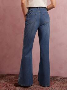 WESTFADE Jeans de mezclilla de tiro alto con vuelo holgado y tachuelas al estilo occidental para festivales de música, estilo vaquera de Nashville