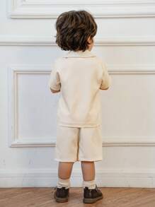 SHEIN Baby Boy 2pcs/Set Lapel Collar Short Sleeve Casual Shirt With Embroidery And Elastic Waist Solid Color Straight Shorts Set - Apricot - View 2