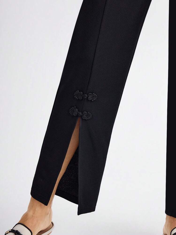 女性用カジュアル ブラック スリムフィットパンツ サイドポケット付き ボタンデザイン