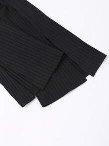 Pantalones con pernera acampanada y abertura para niñas preadolescentes, de cintura ancha y color negro - Negro - Ver 5