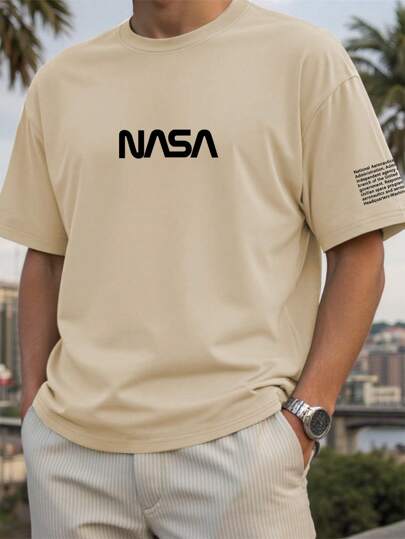 Manfinity Homme 2025 Spring/Summer Plus Size Men's Round Neck Short Sleeve T-Shirt With English Letter Print, Simple & Fashion Casual, Khaki Classic Colors Versatile