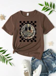 SHEIN Maglietta basic a maniche corte con girocollo per ragazze pre-adolescenti, con stampe grafiche a quadri, floreali e facce spaventose, abiti coordinati/abbinati (venduti separatamente in 2 pezzi)