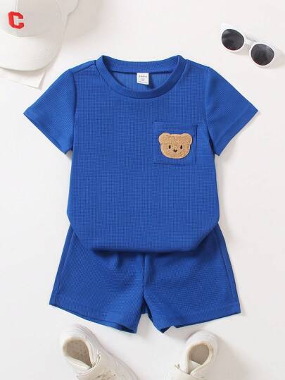 SHEIN 青少年男孩的卡通熊印花口袋短袖t恤和短褲套裝