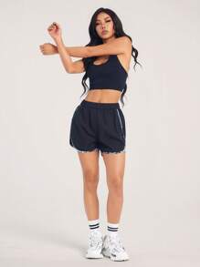 Tropiluxe Pantalones cortos deportivos de mujer con estampado minimalista y patchwork