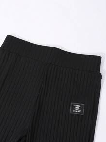 Pantalones con pernera acampanada y abertura para niñas preadolescentes, de cintura ancha y color negro - Negro - Ver 7