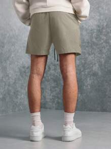 SUMWON Pantalones cortos deportivos de nailon ligeros para entrenamiento, fitness, entrenamiento, running, footing, deporte de rendimiento, de secado rápido y transpirables, con bolsillos laterales, para verano y primavera