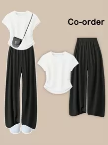 Flirla Plus-size effen ronde hals asymmetrisch geplooid T-shirt met korte mouwen en wijde broek (2-delige set), casual, veelzijdige en relaxte pasvorm voor dagelijks gebruik en feestdagen, lente/herfst