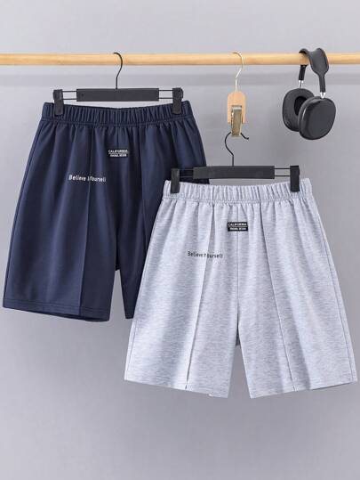 SHEIN Set de 2 pantalones cortos casuales para niños adolescentes, azul y gris, con estampado en inglés, cintura acanalada, adecuados para deportes, ropa urbana, punk, rock, ropa escolar, uso diario/salida/fiesta/festival de música, apropiados para primavera/verano