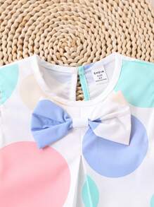 2 件套幼儿女孩可爱波尔卡圆点印花蝴蝶结装饰荷叶边上衣和短裤套装，适合夏季外出、度假和日常穿着