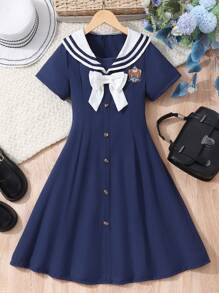 Abito blu navy stile preppy con scollo a V, fiocco e maniche corte per bambine, look carino da divisa scolastica, adatto per primavera/estate