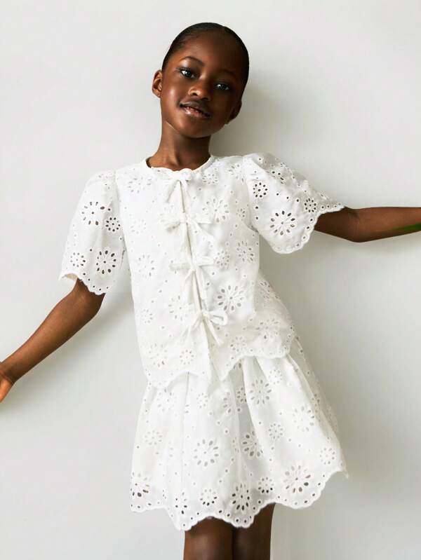 THE HAPPY LOOK Young Girls Vacation Casual Solid Color Hollow Out Embroidery Puff Sleeve Top And Mini Skirt Set