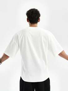 Manfinity Sport PWRUP Tricou cu mânecă scurtă cu gât rotund și cu logo texturizat simplu pentru bărbați, stil sportiv