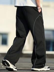 Manfinity Hypemode Men's Fashion Street Sports Style Line Stitching Design Drawstring Waist Pocket Straight Loose Sweatpants, Men's Loose Sweatpants, Foot Drawstring Design Can Be Used As Tapered Pants, Suitable For Daily Wear, Going Out, School, Meeting Friends. Can Be Given To Friends, Boyfriends, Sons.Men's Solid Color Sports Pants