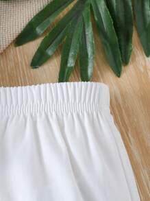 Souflis Souflis 2 pezzi Set bebè maschio: Maglietta elegante e minimale a maniche corte con collo alto e pantaloni in colore a contrasto, adatti per l'estate