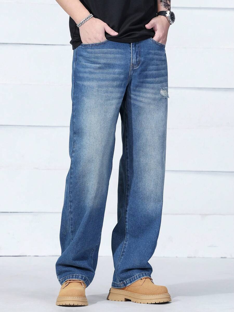 Manfinity EZcore Men's Medium Wash Denim Jeans: Long Zipper Fly Relaxed Fit With Distressed Detail - Medium Wash - View 1