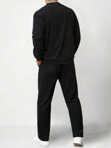 Manfinity Homme Conjunto casual de sudadera de cuello redondo de unicolor de manga larga y pantalón de chándal para hombre